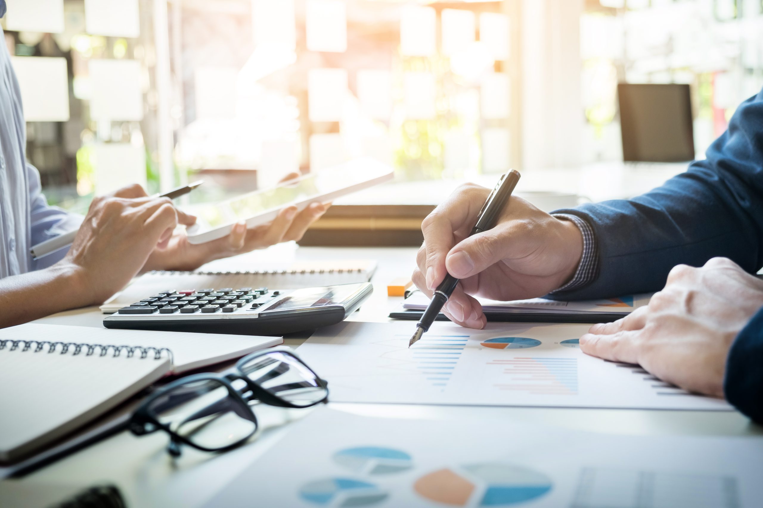business man financial inspector secretary making report calculating checking balance internal revenue service inspector checking document audit concept scaled